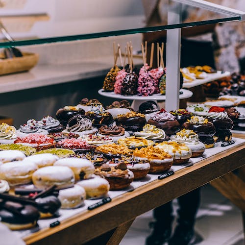 Photo by Igor Ovsyannykov: https://www.pexels.com/photo/donuts-and-bagel-display-205961/